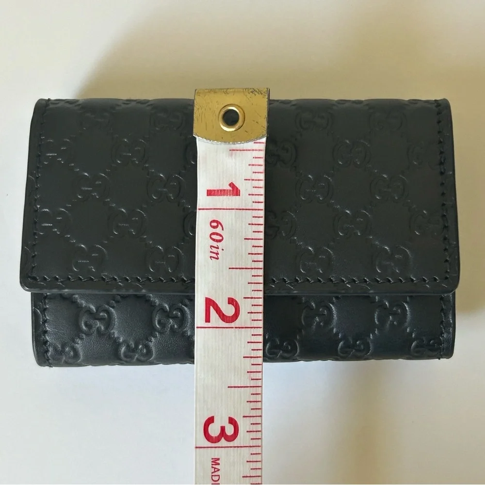 Gucci Black Microguccisima GG Logo Embossed Front closure Leather 6 Key Holder